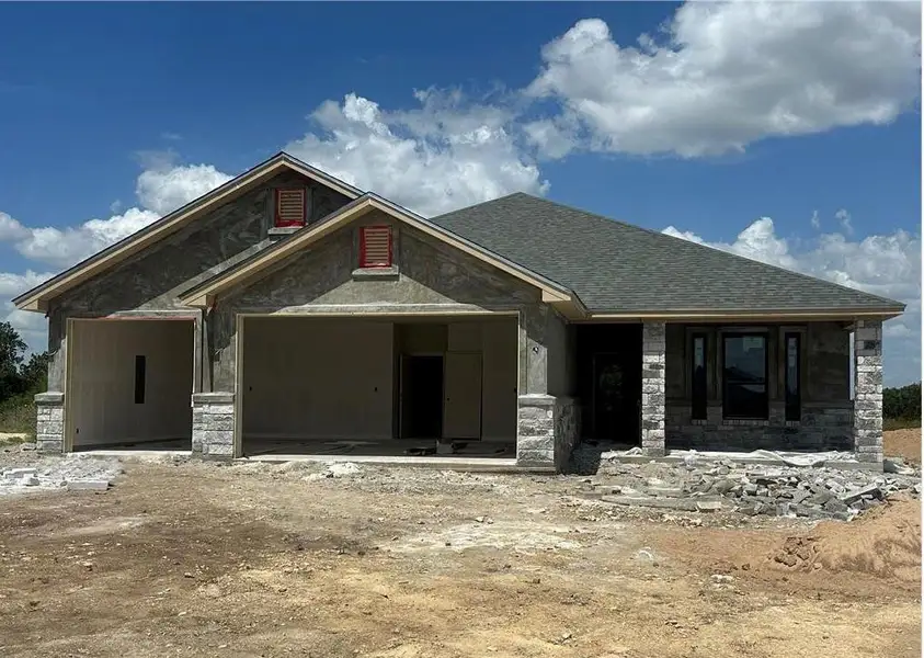 Front exterior of a new home in , Belton, TX, highlighting curb appeal (Image 1).