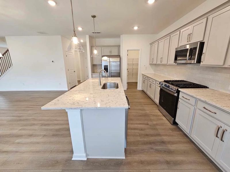Kitchen featuring Milan Collection Finishes