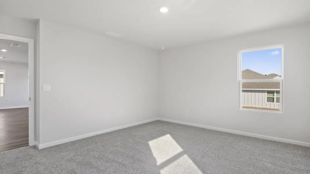 Spacious, unfurnished interior of a new home in Magnolia at the Bluffs Phase 3, Freeport (Image 18).