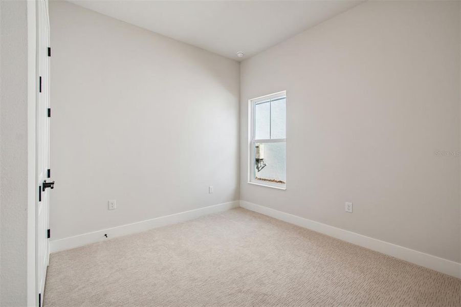 Spacious, unfurnished interior of a new home in Emerald Landing at Waterside at Lakewood Ranch – Lake Series, Sarasota (Image 32).