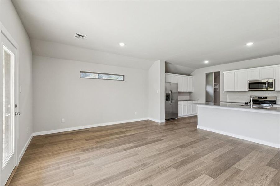 Dining Room in the Heisman home plan by Trophy Signature Homes – REPRESENTATIVE PHOTO Dining Room in the Heisman home plan by Trophy Signature Homes – REPRESENTATIVE PHOTO