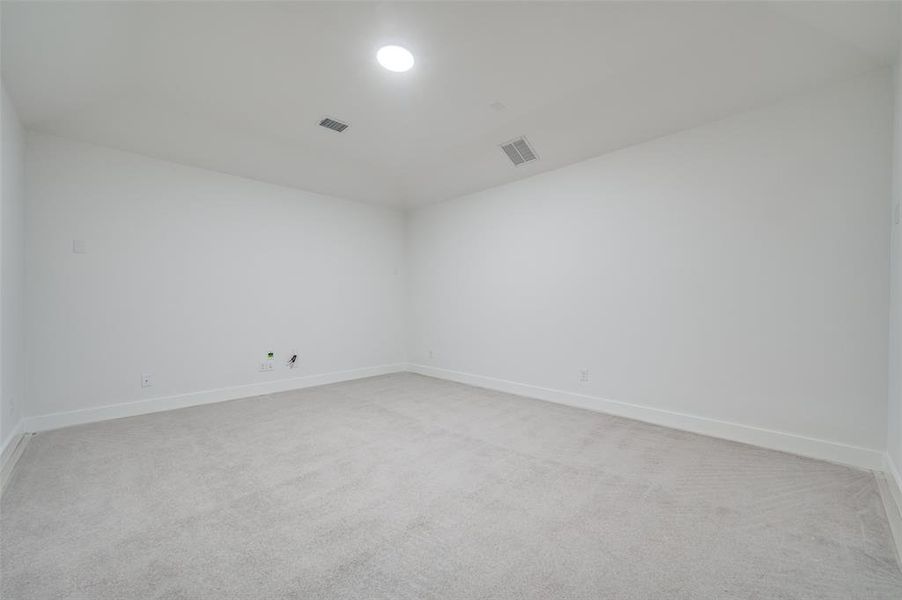 Empty room with carpet floors