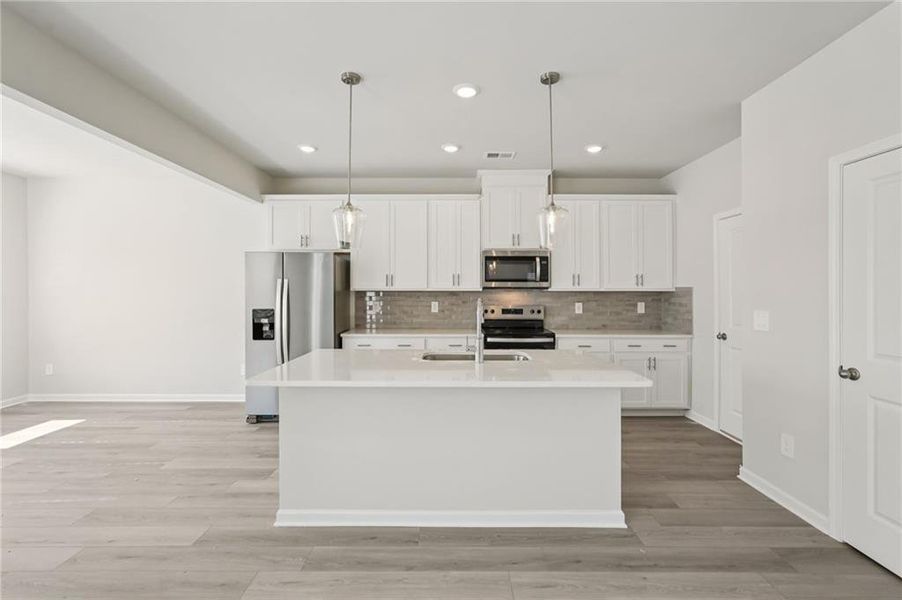Furnished interior view inside a new home in Hawthorne Station, College Park (Image 16).