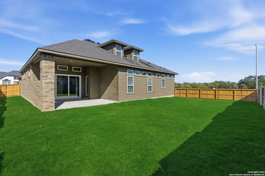 Exterior details and patio area of a home in Mesa Western, Cibolo (Image 25).