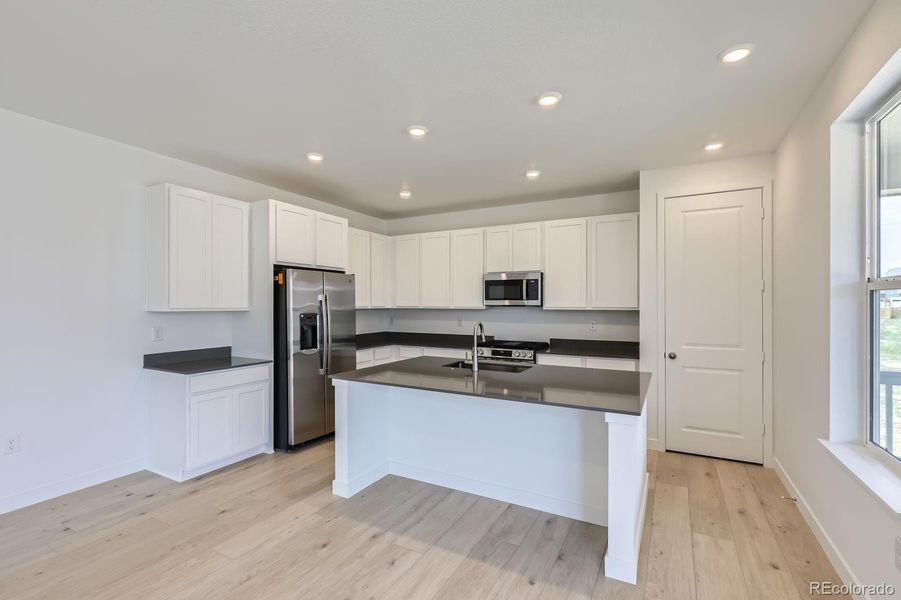 Furnished interior view inside a new home in Brighton Crossings: The Grand Collection, Brighton (Image 4).