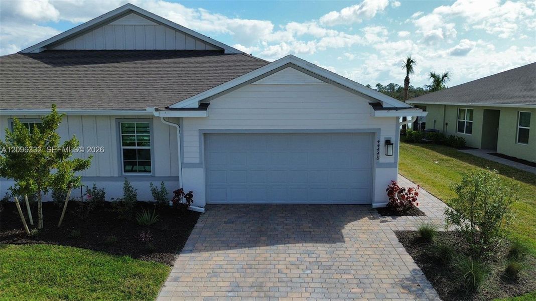 Front exterior of a new home in , Punta Gorda, FL, highlighting curb appeal (Image 2). Front exterior of a new home in , Punta Gorda, FL, highlighting curb appeal (Image 2).