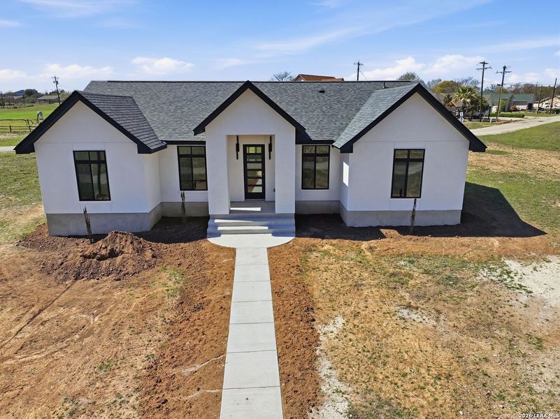 Exterior details and patio area of a home in , Bandera (Image 32).