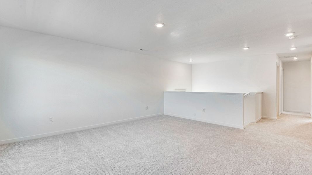 Spacious, unfurnished interior of a new home in Trails at Crowfoot, Parker (Image 19).