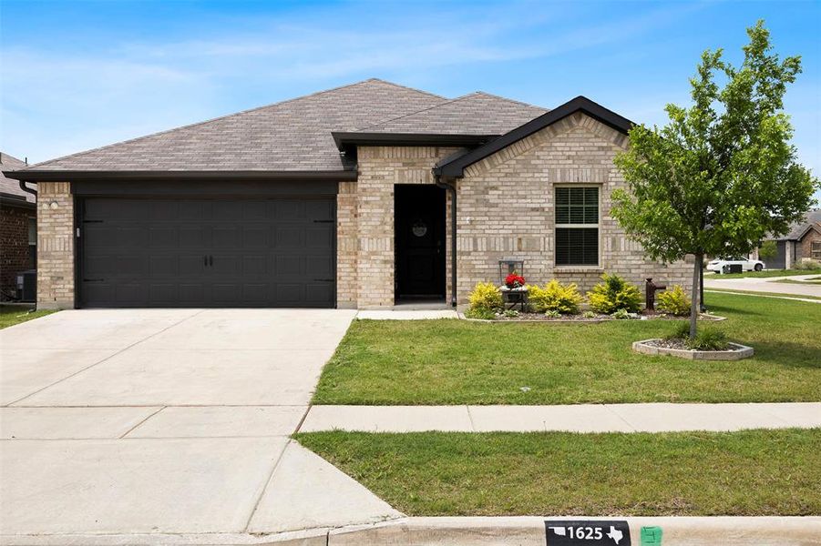 Front exterior of a new home in , Lancaster, TX, highlighting curb appeal (Image 21).