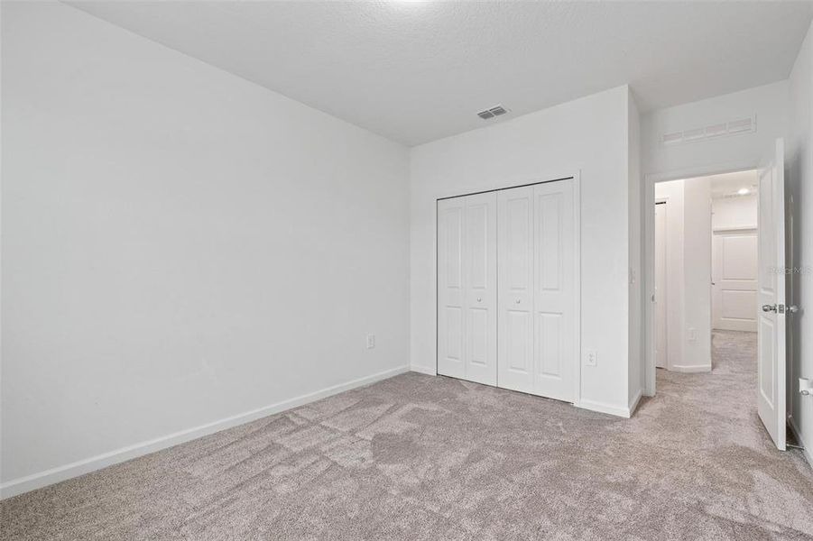 Spacious, unfurnished interior of a new home in Lake Wilson Reserve, Kissimmee (Image 19). Spacious, unfurnished interior of a new home in Lake Wilson Reserve, Kissimmee (Image 19).