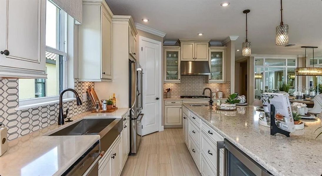 Furnished interior view inside a new home in Esplanade at Wiregrass Ranch, Wesley Chapel (Image 8).