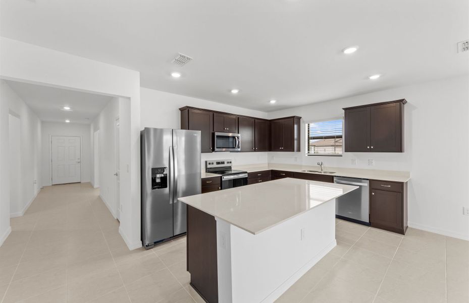 Furnished interior view inside a new home in Whispering Lakes, Lehigh Acres (Image 11).