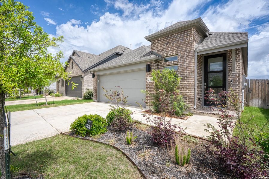 Exterior details and patio area of a home in Legacy at Lake Dunlap, New Braunfels (Image 21).