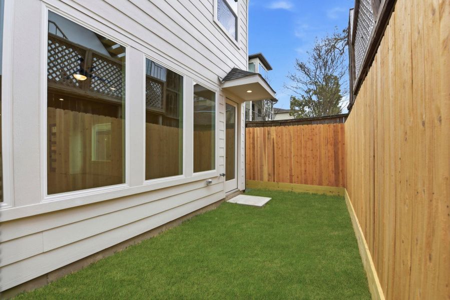 Exterior details and patio area of a home in , Houston (Image 4).