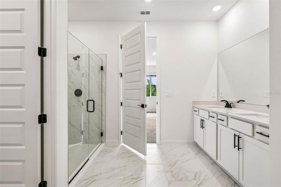 Furnished interior view inside a new home in The Grove at Stuart Crossing - Signature Series, Bartow (Image 16).