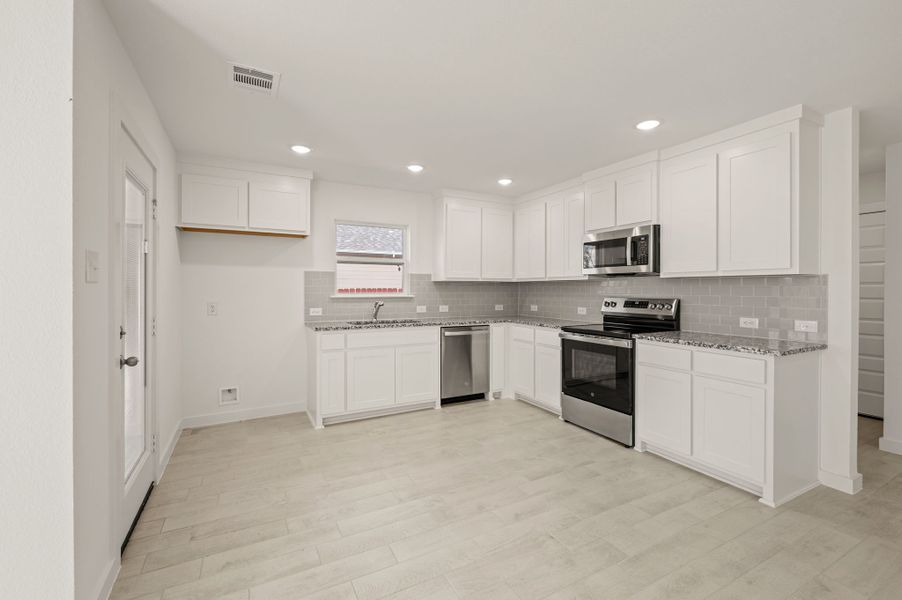 Furnished interior view inside a new home in Runaway Bay, Runaway Bay (Image 6).