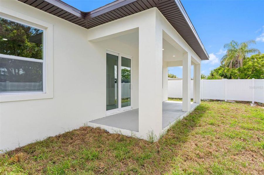 Exterior details and patio area of a home in , Port Richey (Image 23).