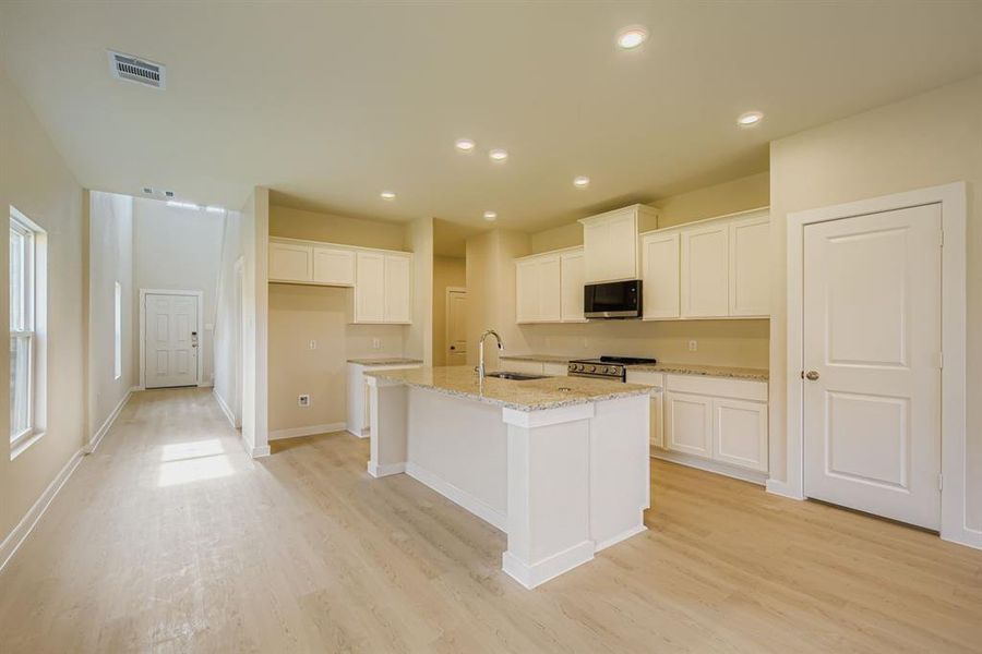 Furnished interior view inside a new home in Sperling Farms, Ferris (Image 7).