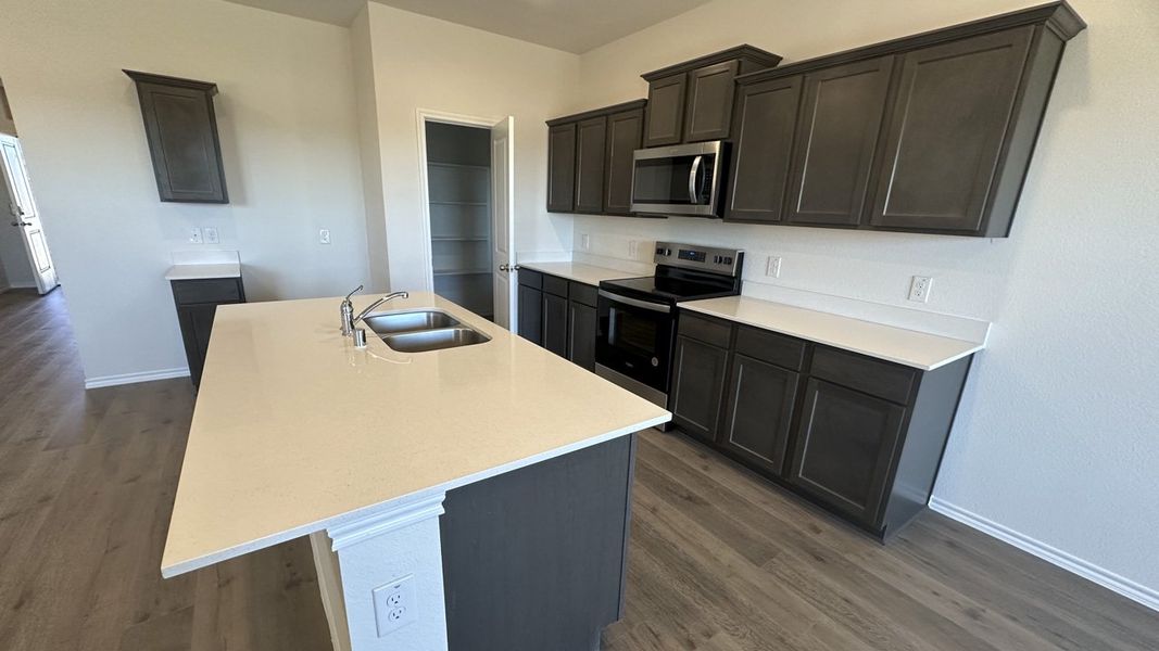 Representative furnished interior of a home built from the NAPLES by D.R. Horton in Northspur, Forney (Image 6). Representative furnished interior of a home built from the NAPLES by D.R. Horton in Northspur, Forney (Image 6).