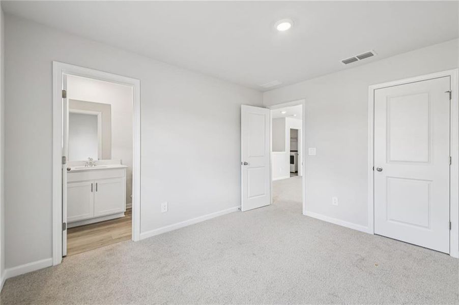 Spacious, unfurnished interior of a new home in Creekside at Oxford Park, Fairburn (Image 43).