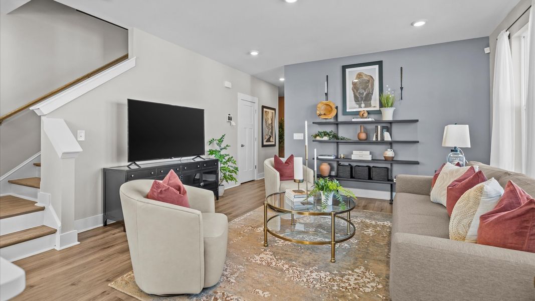 Highly functional family room with established charm and current styling in a reputable community at Brookland Place