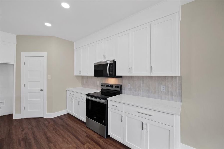 Furnished interior view inside a new home in , The Colony (Image 9).