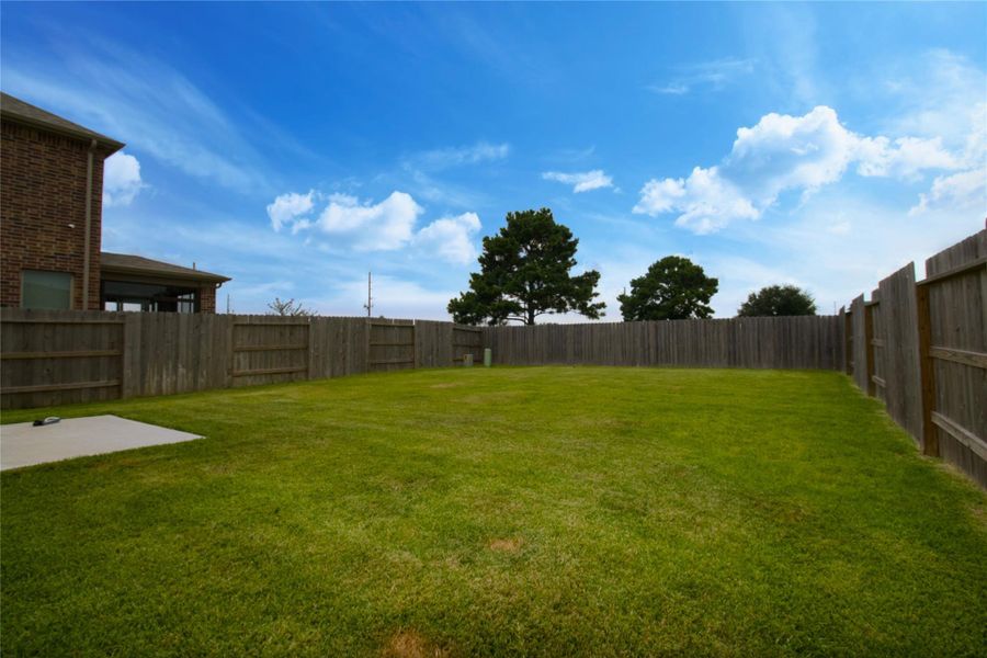 Exterior details and patio area of a home in , Katy (Image 4). Exterior details and patio area of a home in , Katy (Image 4).