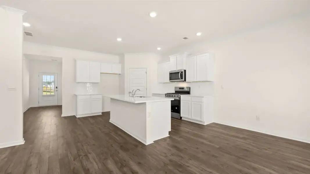 Furnished interior view inside a new home in The Highlands at Cedar Hill Landing, Navassa (Image 5).