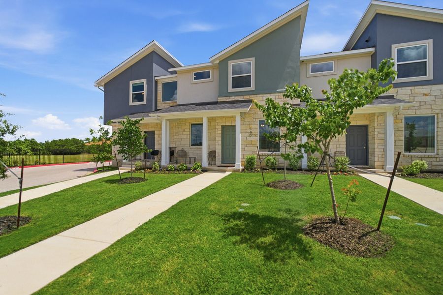 Representative exterior photo of a completed home built from the Mies by CastleRock Communities in Municipal Drive Townhomes, Leander, TX (Image 2). Representative exterior photo of a completed home built from the Mies by CastleRock Communities in Municipal Drive Townhomes, Leander, TX (Image 2).