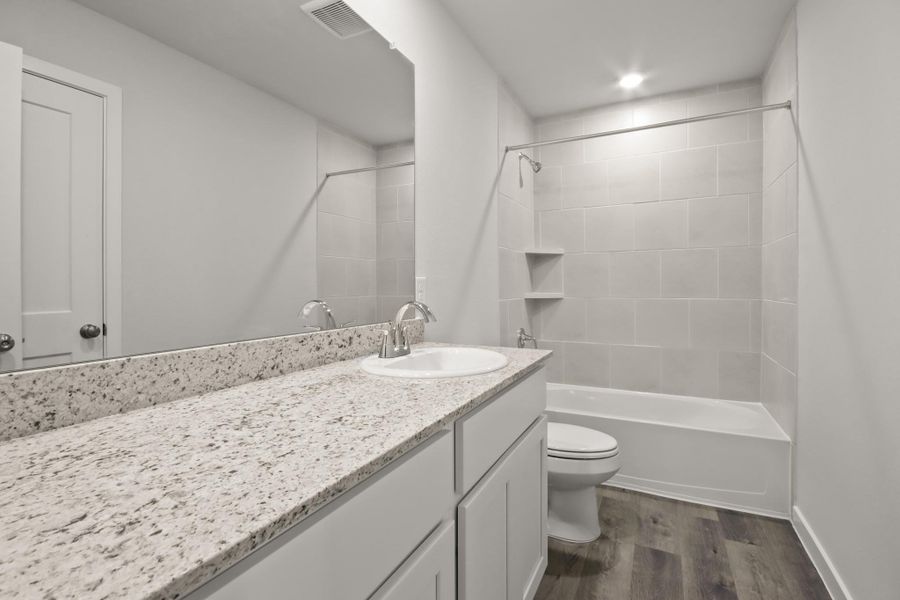 Furnished interior view inside a new home in Lakes at Crockett Martin, Conroe (Image 4).