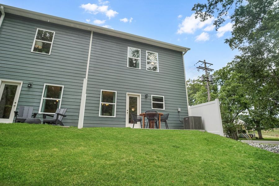 Front exterior of a new home in Ironhorse, Dickson, TN, highlighting curb appeal (Image 22).