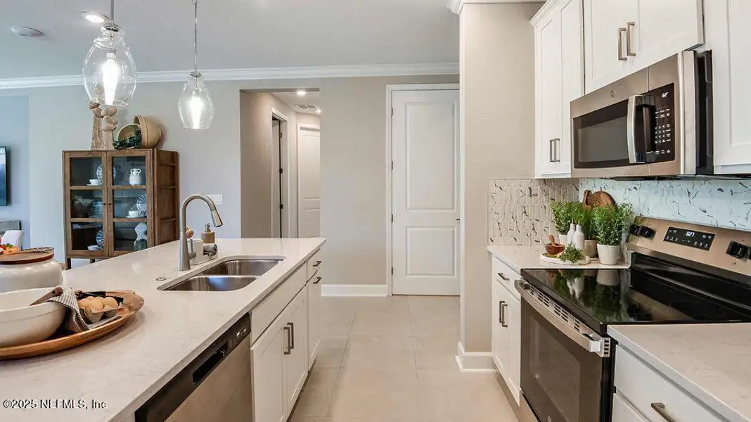 Furnished interior view inside a new home in Colbert Landings, Palm Coast (Image 7).