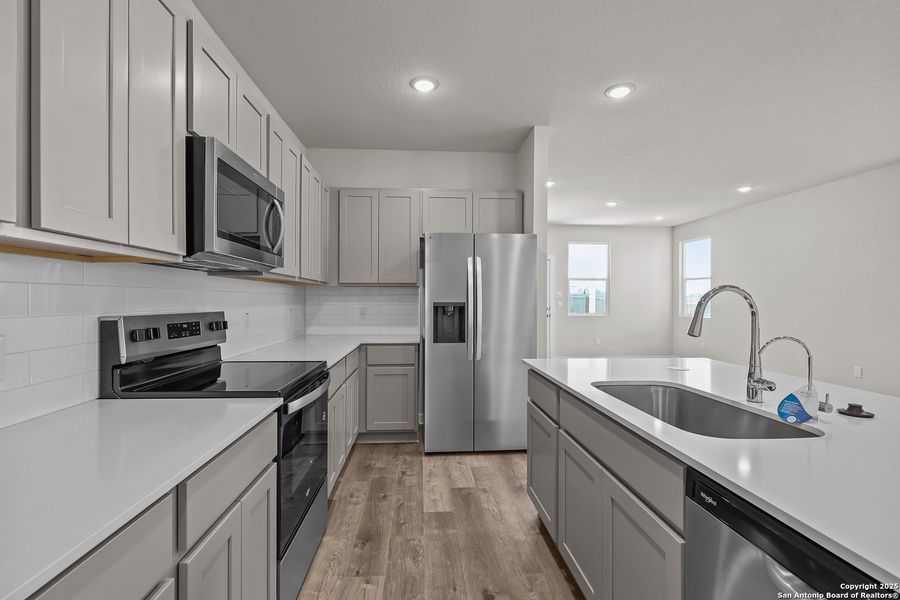 Furnished interior view inside a new home in Applewhite Meadows, San Antonio (Image 9). Furnished interior view inside a new home in Applewhite Meadows, San Antonio (Image 9).