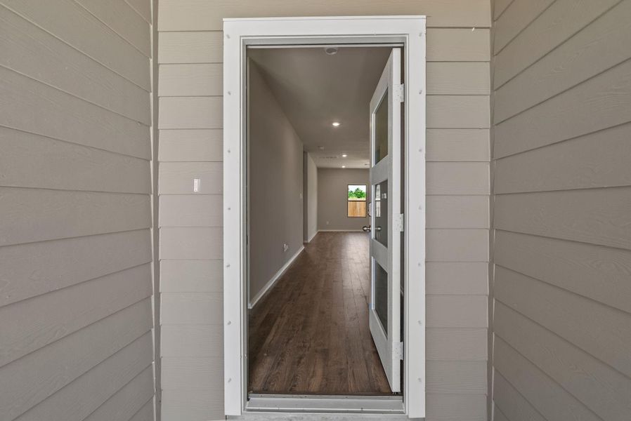 Exterior details and patio area of a home in Windcress, Cove (Image 3).