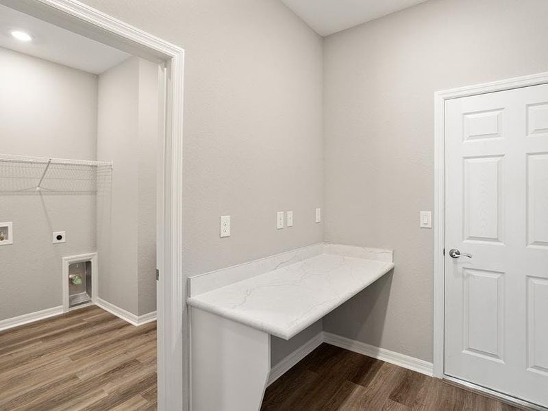 You will find convenient features throughout, such as a mud room and a dedicated laundry room.