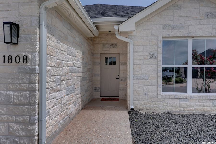 Exterior details and patio area of a home in , Kerrville (Image 4).