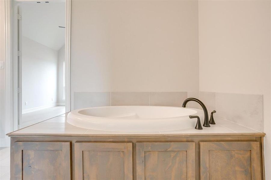 Bathroom with lofted ceiling