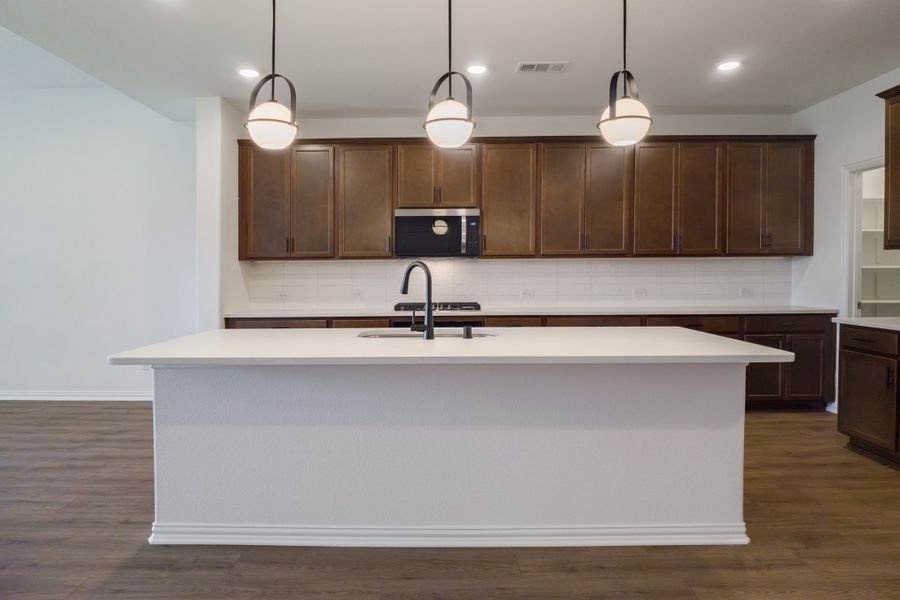 Furnished interior view inside a new home in The Villages of Hurricane Creek, Anna (Image 9).