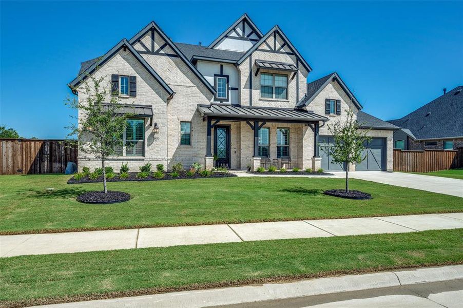Front exterior of a new home in , Mansfield, TX, highlighting curb appeal (Image 2).