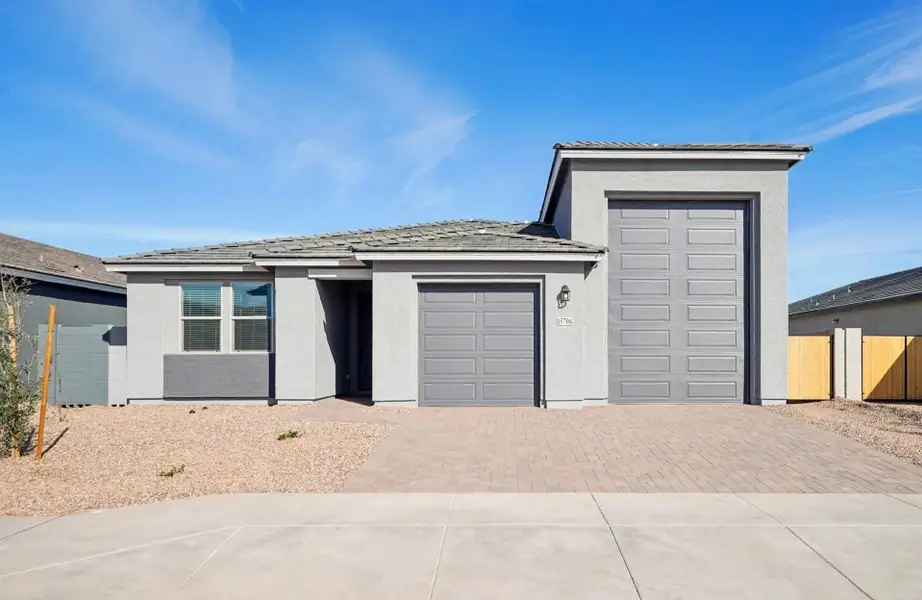 Representative exterior photo of a completed home built from the Opal RV Garage by Ashton Woods in Rancho Mirage, Maricopa, AZ (Image 2). Representative exterior photo of a completed home built from the Opal RV Garage by Ashton Woods in Rancho Mirage, Maricopa, AZ (Image 2).