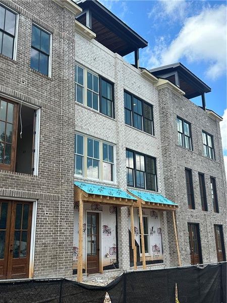 Front exterior of a new home in , Cartersville, GA, highlighting curb appeal (Image 2). Front exterior of a new home in , Cartersville, GA, highlighting curb appeal (Image 2).