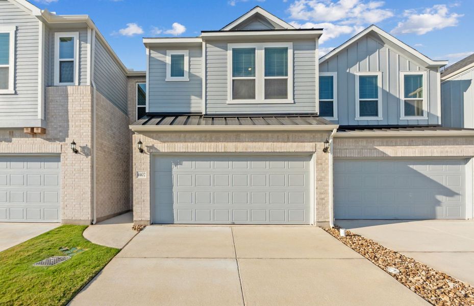 Front exterior of a new home in Northpoint at Old Settlers, Round Rock, TX, highlighting curb appeal (Image 1). Front exterior of a new home in Northpoint at Old Settlers, Round Rock, TX, highlighting curb appeal (Image 1).