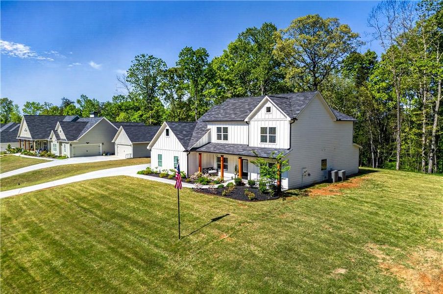 Front exterior of a new home in , Dahlonega, GA, highlighting curb appeal (Image 25).
