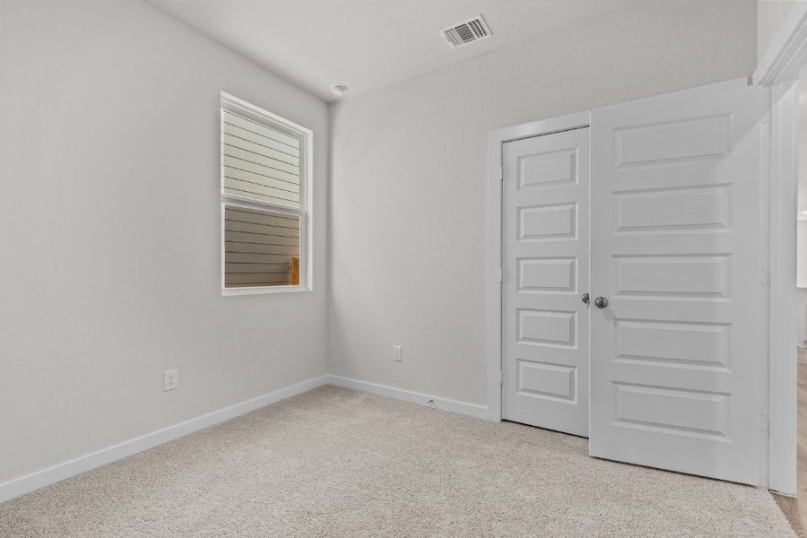 A room with white doors.