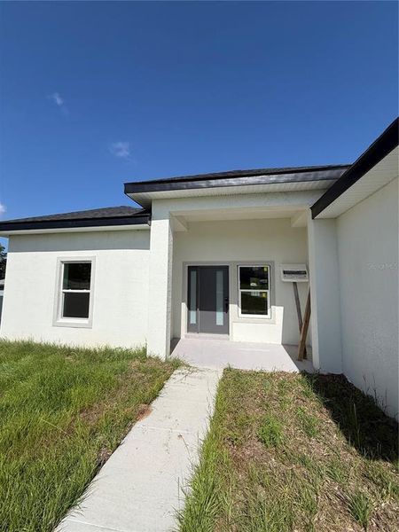 Exterior details and patio area of a home in , Ocala (Image 24).