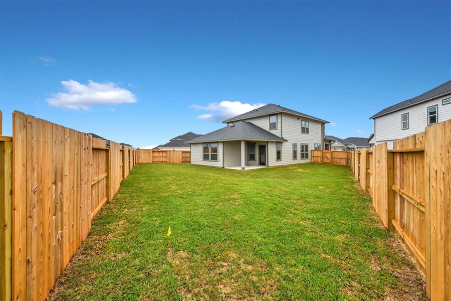 Exterior details and patio area of a home in La Segarra 40', Brookshire (Image 3).