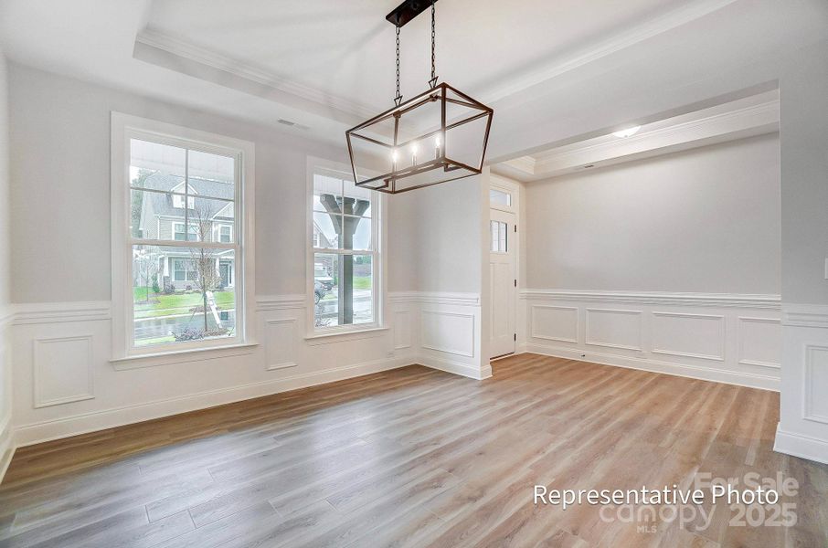 Example of a dining room with tray ceiling