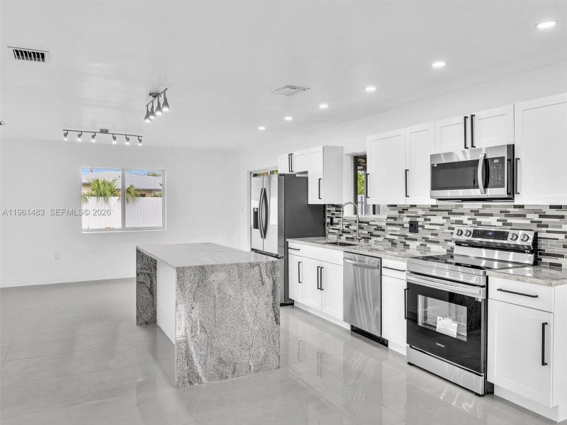 Furnished interior view inside a new home in , North Miami (Image 5).