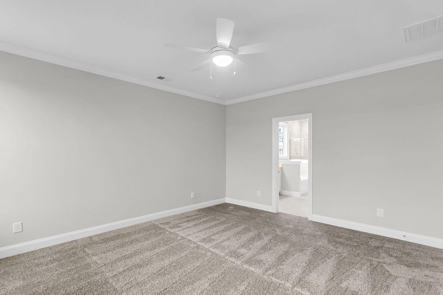 Spacious, unfurnished interior of a new home in Tidewater at Lakes of Cane Bay, Summerville (Image 22).