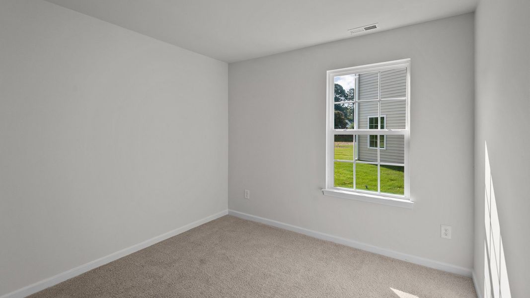 Spacious, unfurnished interior of a new home in Hobbs Farm, Ayden (Image 10). Spacious, unfurnished interior of a new home in Hobbs Farm, Ayden (Image 10).